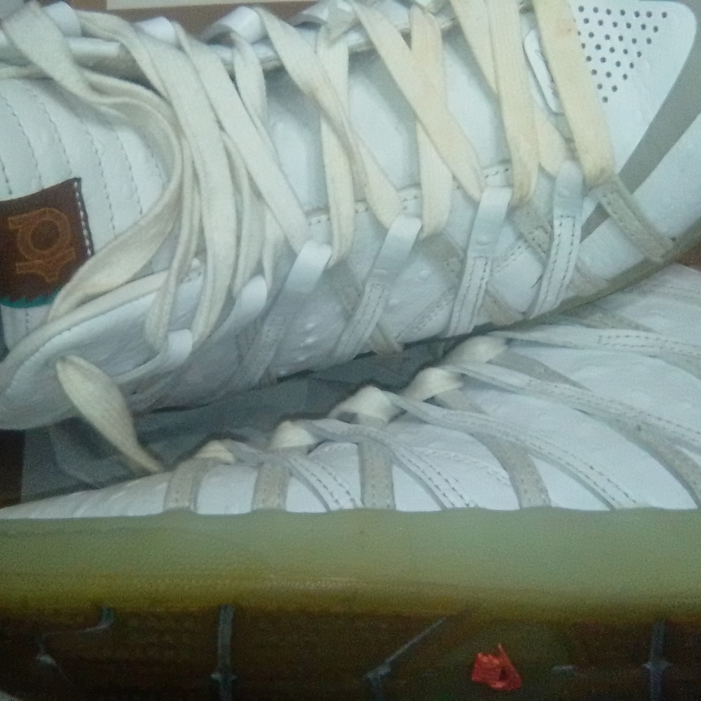 Nike White and Cream Sneakers with Perforated Design